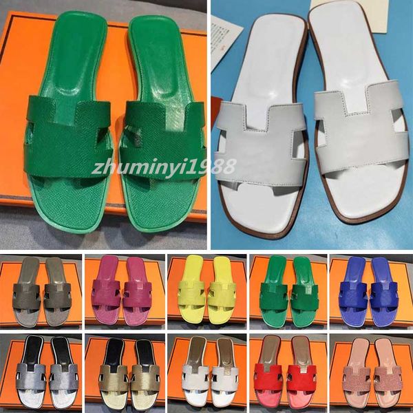 2022 famous brand beach slippers classic flat heel summer designer fashion flops leather lady slides women shoes l bath ladies sandals large, White;red
2022 famous brand beach slippers classic flat heel summer designer fashion flops leather lady slides women shoes l bath ladies sandals large, White;red