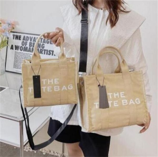 2022 marc the tote bag famous designer cool practical large capacity shoulder handbag women great coin purse crossbody casual square canvas, Black;red
2022 marc the tote bag famous designer cool practical large capacity shoulder handbag women great coin purse crossbody casual square canvas, Black;red