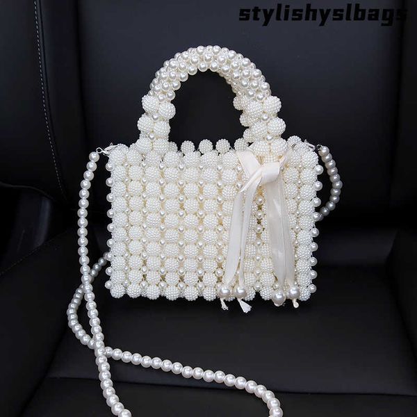 totes 2021 new handmade beaded hollow pearl bag fashion handbag woven mini bucket bag solid color diagonal mobile phone coin purse 011323h
totes 2021 new handmade beaded hollow pearl bag fashion handbag woven mini bucket bag solid color diagonal mobile phone coin purse 011323h