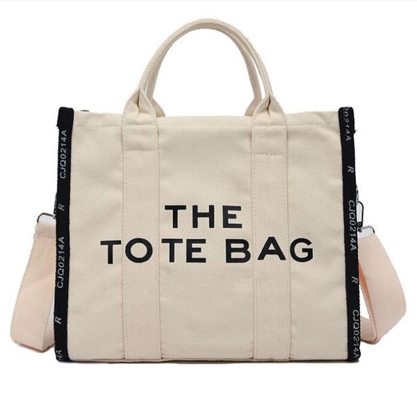 totes the tote bag women canvas handbag designer shopping designer shoulder messenger beach handbag letters on the back r230113
totes the tote bag women canvas handbag designer shopping designer shoulder messenger beach handbag letters on the back r230113