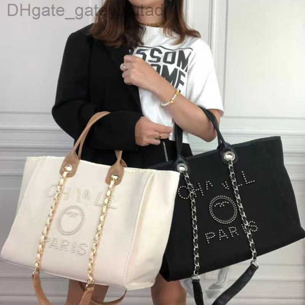 evening luxury women's bags classic ch brand canvas handbag fashion pearl beach hand bag designer female large backpack small packs por
evening luxury women's bags classic ch brand canvas handbag fashion pearl beach hand bag designer female large backpack small packs por