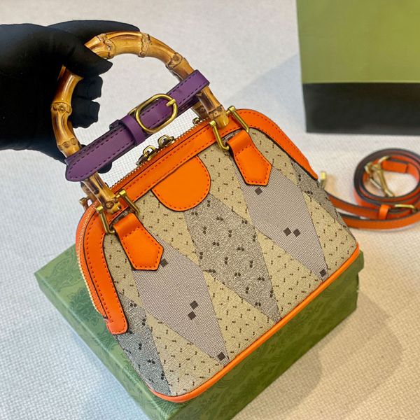 women's shell bag bamboo handle shoulder bags handbag tote purse classic letter print rivet decoration removable leather shoulder strap
women's shell bag bamboo handle shoulder bags handbag tote purse classic letter print rivet decoration removable leather shoulder strap