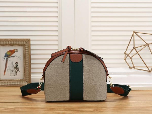 fashion classic vintage crossbody bag decorative oval leather tag removable classic canvas strap
fashion classic vintage crossbody bag decorative oval leather tag removable classic canvas strap