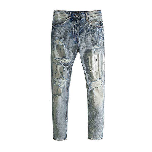 men's jeans blue cow with holes to make old stickers leather letters slim skinny high street fashion brand
men's jeans blue cow with holes to make old stickers leather letters slim skinny high street fashion brand