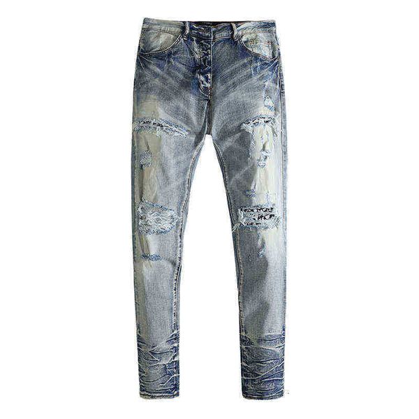 men's jeans wash water blue hole worn similar to cashew nut light color slim fit and women's high street fashion brand
men's jeans wash water blue hole worn similar to cashew nut light color slim fit and women's high street fashion brand