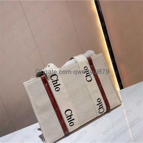 totes 2022 fashion designer handbag summer new large volume canvas tote bag simple printed letter women's bag single shoulder 012023h
totes 2022 fashion designer handbag summer new large volume canvas tote bag simple printed letter women's bag single shoulder 012023h