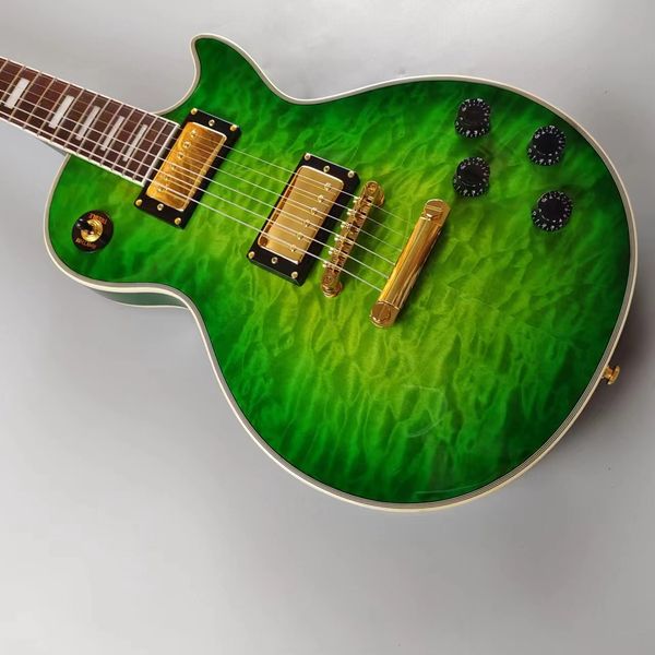 custom electric guitar green flower oem gold and pickup imported paint mahogany body available
custom electric guitar green flower oem gold and pickup imported paint mahogany body available