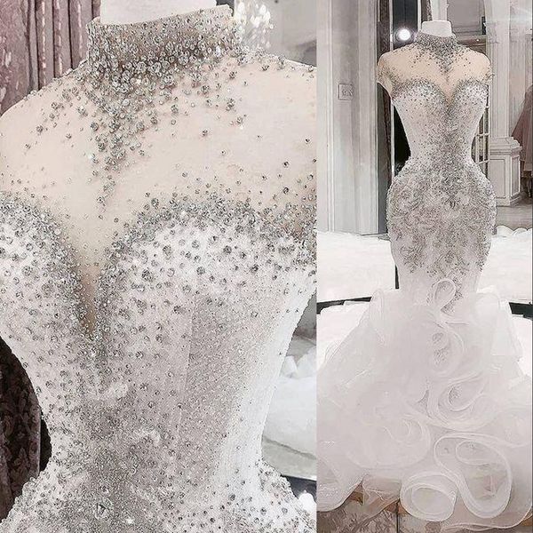 2023 luxurious mermaid wedding dresses arabic silver crystals beaded high neck illusion ruffles tiered bridal dresses cap sleeves bridal gow, White
2023 luxurious mermaid wedding dresses arabic silver crystals beaded high neck illusion ruffles tiered bridal dresses cap sleeves bridal gow, White