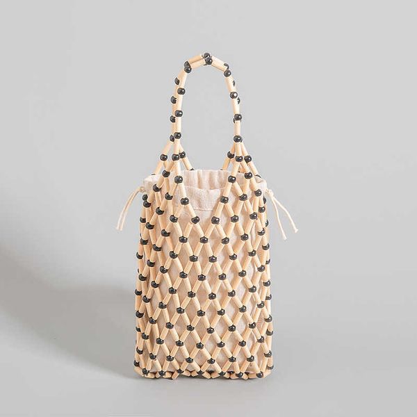 fashion hollow beading women handbags designer wooden shoulder bags casual fishnet summer beach small tote bag bali purses 2023 230129
fashion hollow beading women handbags designer wooden shoulder bags casual fishnet summer beach small tote bag bali purses 2023 230129