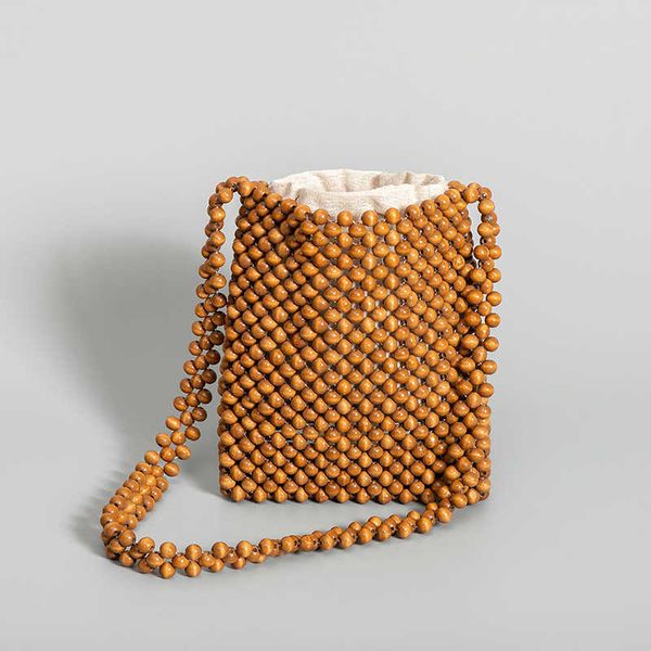 vintage wooden beading women shoulder bags handmade wide strap crossbody casual summer beach small tote bali purses 2023 230129
vintage wooden beading women shoulder bags handmade wide strap crossbody casual summer beach small tote bali purses 2023 230129