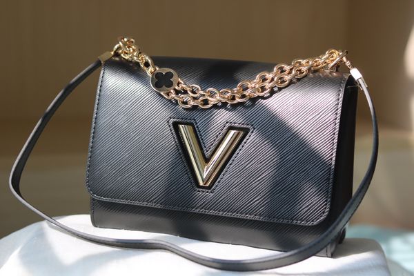 epi leather twist crossbody bags women designer black white lady with leather strap purse letter twistable gold lock
epi leather twist crossbody bags women designer black white lady with leather strap purse letter twistable gold lock