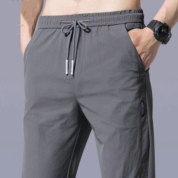 men's pants streetwear fashion men thin suits spring summer male clothes business casual laceup elastic loose straight sweat trousers 2, Black
men's pants streetwear fashion men thin suits spring summer male clothes business casual laceup elastic loose straight sweat trousers 2, Black