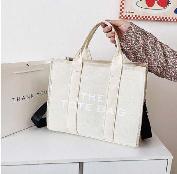 new the tote bag designer bags single totes designer bag man women bag casual canvas fashion shoulder bag crossbody bag shopping handbag 016
new the tote bag designer bags single totes designer bag man women bag casual canvas fashion shoulder bag crossbody bag shopping handbag 016