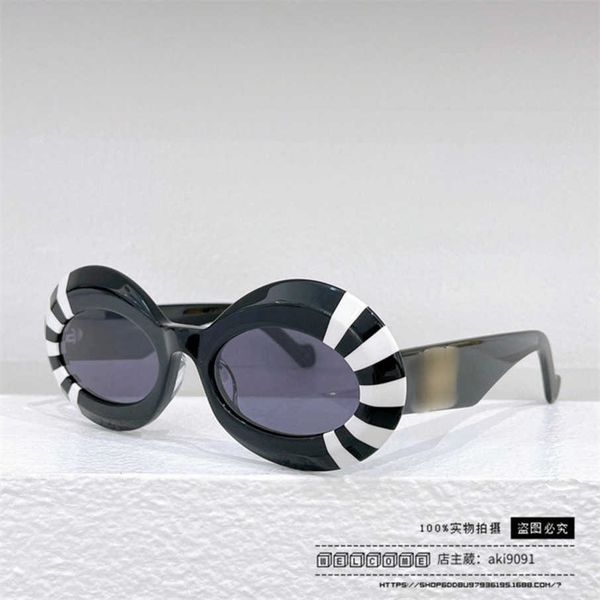 2023 luxury designer 23 new luo yijia sunglasses round frame mesh red ins the same style personalized and fashionable sunglasses lw40091, White;black
2023 luxury designer 23 new luo yijia sunglasses round frame mesh red ins the same style personalized and fashionable sunglasses lw40091, White;black