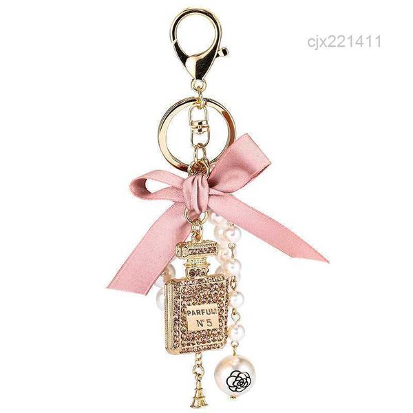 fashion imitation pearl perfume bottle keychain car key ring charm accessories cute creative keyrings 1o7y, Silver
fashion imitation pearl perfume bottle keychain car key ring charm accessories cute creative keyrings 1o7y, Silver
