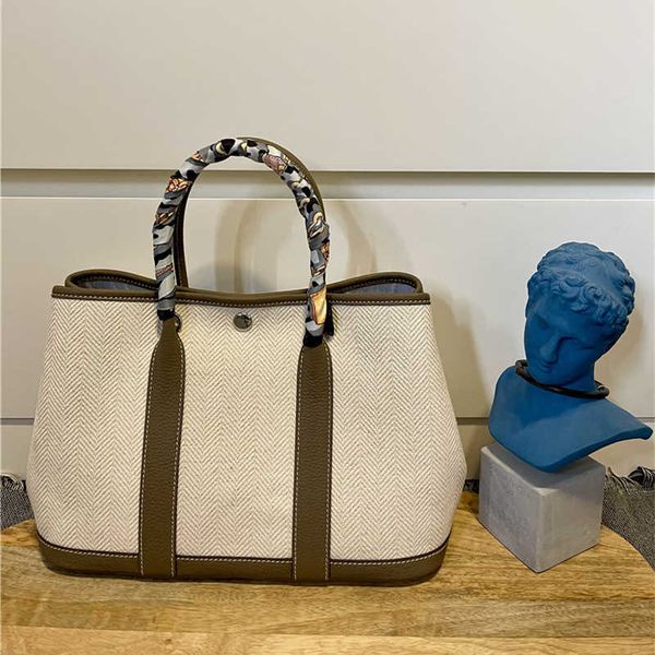 luxury h ermes party garden designer tote bags for women layer cowhide canvas blank version garden bag crossbody portable casual temperam wi
luxury h ermes party garden designer tote bags for women layer cowhide canvas blank version garden bag crossbody portable casual temperam wi