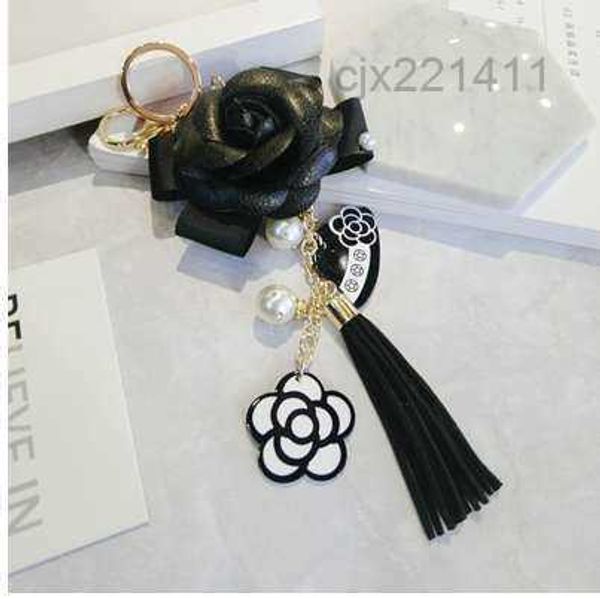 famous keyring black white leather camellia flower keychain fashion key chains llaveros flore charms jkp4, Silver
famous keyring black white leather camellia flower keychain fashion key chains llaveros flore charms jkp4, Silver