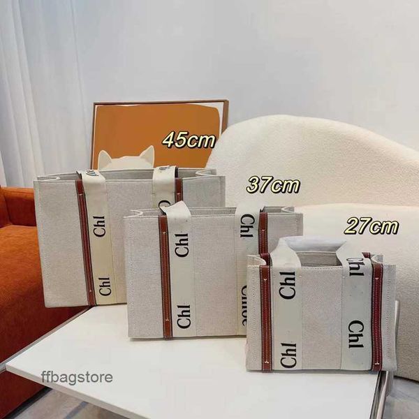 cloe woody tote designer bag girl lady bags fashion women's casual canvas letter crossbody small design handheld tote
cloe woody tote designer bag girl lady bags fashion women's casual canvas letter crossbody small design handheld tote
