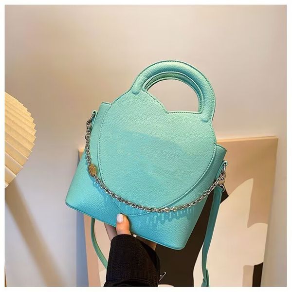 real cowhide bag bucket bag women one shoulder crossbody bag designer handbag litchi grain chain decoration tote luxury shopping bags leathe
real cowhide bag bucket bag women one shoulder crossbody bag designer handbag litchi grain chain decoration tote luxury shopping bags leathe