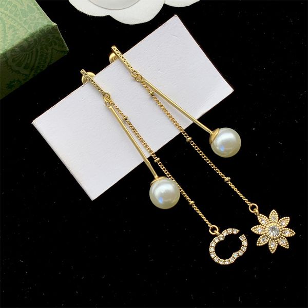 pearl sunflower earrings ladies vintage copper long tassel pendant flowers hollow diamond letter earrings antique classic jewelry, Golden
pearl sunflower earrings ladies vintage copper long tassel pendant flowers hollow diamond letter earrings antique classic jewelry, Golden