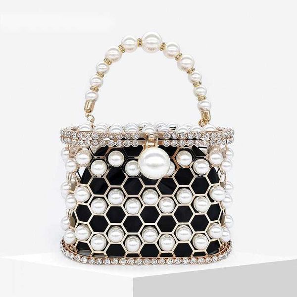 evening bags beaded pearl clutch handbag women 2023 rhinestone metal honeycomb purse ladies wedding design luxury 230427
evening bags beaded pearl clutch handbag women 2023 rhinestone metal honeycomb purse ladies wedding design luxury 230427