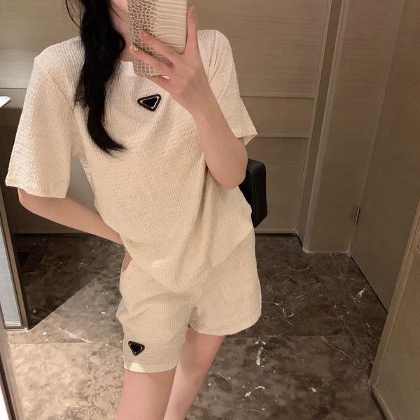 women's two piece pants spring summer triangle logo short sleeve t-shirt elastic waist shorts casual fashion set for women, White
women's two piece pants spring summer triangle logo short sleeve t-shirt elastic waist shorts casual fashion set for women, White