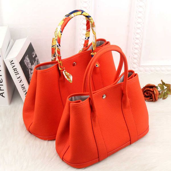 8a quality h ermes party garden designer tote bags for women wholesale new layer cowhide women's bag genuine leather handheld one shoul
8a quality h ermes party garden designer tote bags for women wholesale new layer cowhide women's bag genuine leather handheld one shoul