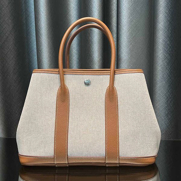 wholesale original party garden home tote bags online shop high edition canvas version garden bag with a size of 30 20cm lightweight workman
wholesale original party garden home tote bags online shop high edition canvas version garden bag with a size of 30 20cm lightweight workman
