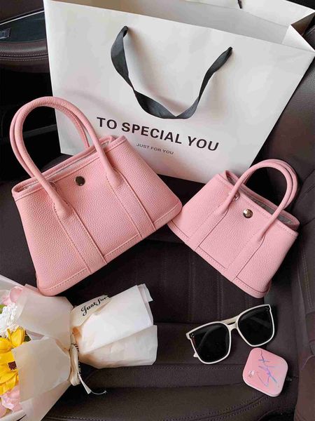luxury designer h ermes party garden tote bags for sale bag litchi pattern portable bucket small design single shoulder messenger large capa
luxury designer h ermes party garden tote bags for sale bag litchi pattern portable bucket small design single shoulder messenger large capa