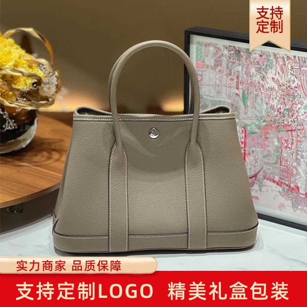 wholesale original party garden home tote bags online shop layer cowhide togo leather garden bag for womens highend feel with large capacity
wholesale original party garden home tote bags online shop layer cowhide togo leather garden bag for womens highend feel with large capacity