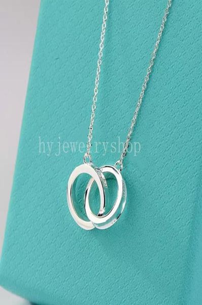 t designer two ring pendant necklace bracelet stud earrings women luxury brand jewelry classic fashion 925 sterlling silver rose g6858684
t designer two ring pendant necklace bracelet stud earrings women luxury brand jewelry classic fashion 925 sterlling silver rose g6858684