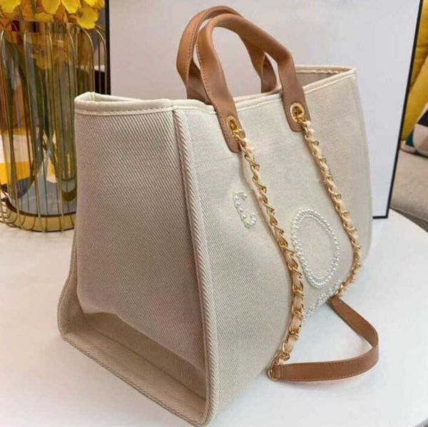 luxury women's fashion beach bags pearl hand bag brand designers women tote evening handbag large capacity female backpacks small porta
luxury women's fashion beach bags pearl hand bag brand designers women tote evening handbag large capacity female backpacks small porta