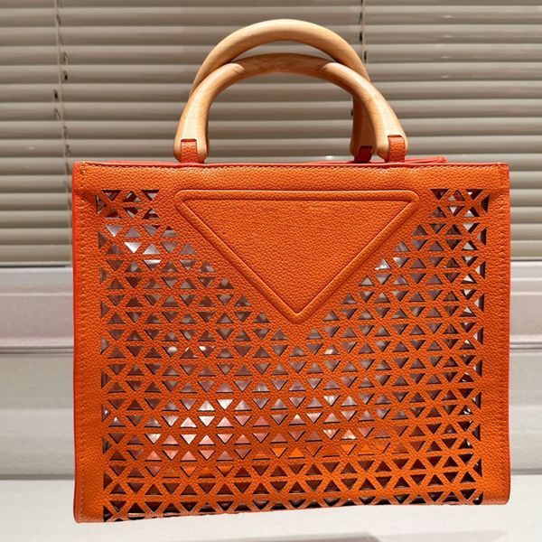 large capacity hollow bag women handbag plain tote bags genuine leather material quality wooden handle fashion letter clutch triangle decora
large capacity hollow bag women handbag plain tote bags genuine leather material quality wooden handle fashion letter clutch triangle decora