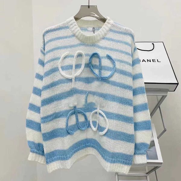 2023 autumn and winter advanced feel casual age reducing blue and white stripe hollow pullover knitted sweater for women, White;black
2023 autumn and winter advanced feel casual age reducing blue and white stripe hollow pullover knitted sweater for women, White;black