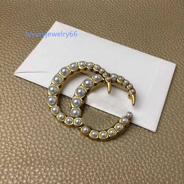 luxury designer fashion pearl letter pins brooches men's and women's same style used for suit sweater brooch jewelry, Gray
luxury designer fashion pearl letter pins brooches men's and women's same style used for suit sweater brooch jewelry, Gray