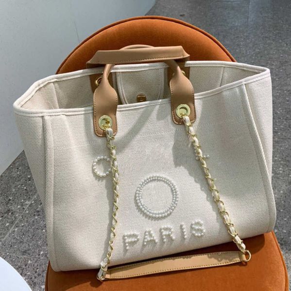 classic women's luxury evening bags pearl beach handbag brand cc designers women tote bag large capacity female backpack small portable, Black;red
classic women's luxury evening bags pearl beach handbag brand cc designers women tote bag large capacity female backpack small portable, Black;red