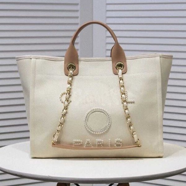 luxury fashion women's evening bags pearl beach handbag brand designers women tote bag large capacity female backpack small portable pa
luxury fashion women's evening bags pearl beach handbag brand designers women tote bag large capacity female backpack small portable pa