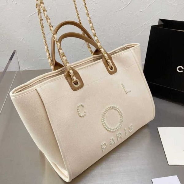 classic women's luxury evening bags pearl beach handbag brand designers women tote bag large capacity female backpack small portable pa
classic women's luxury evening bags pearl beach handbag brand designers women tote bag large capacity female backpack small portable pa