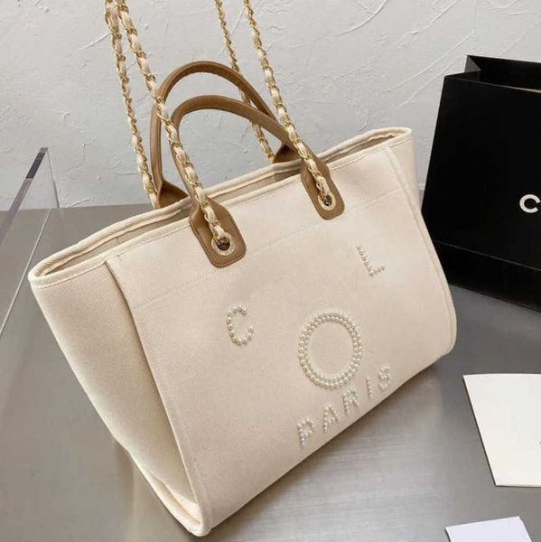 luxury women's classic evening bags pearl beach handbag brand cc designers women tote bag large capacity female backpack small portable
luxury women's classic evening bags pearl beach handbag brand cc designers women tote bag large capacity female backpack small portable
