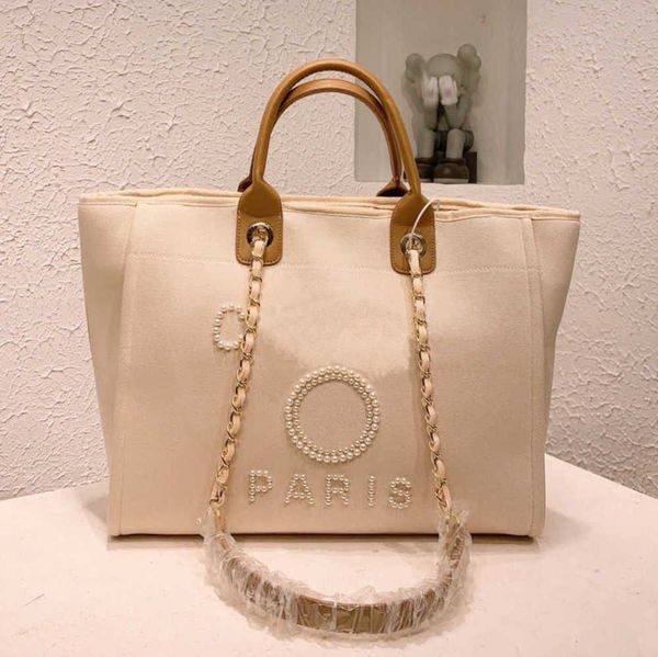 fashion luxury women's beach bags pearl hand bag brand designers women tote evening handbag large capacity female backpacks small porta
fashion luxury women's beach bags pearl hand bag brand designers women tote evening handbag large capacity female backpacks small porta