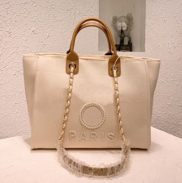 luxury fashion women's beach bags pearl hand bag brand cc designers women tote evening handbag large capacity female backpacks small po
luxury fashion women's beach bags pearl hand bag brand cc designers women tote evening handbag large capacity female backpacks small po