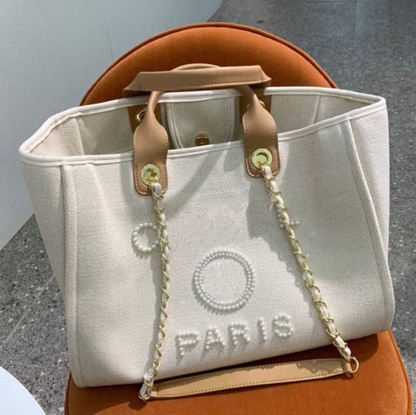 classic luxury women's evening bags pearl beach handbag brand designers women tote bag large capacity female backpack small portable pa
classic luxury women's evening bags pearl beach handbag brand designers women tote bag large capacity female backpack small portable pa