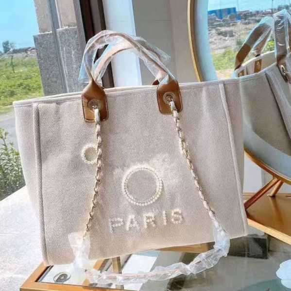 luxury fashion women's beach bags pearl hand bag brand cc designers women tote evening handbag large capacity female backpacks small po
luxury fashion women's beach bags pearl hand bag brand cc designers women tote evening handbag large capacity female backpacks small po