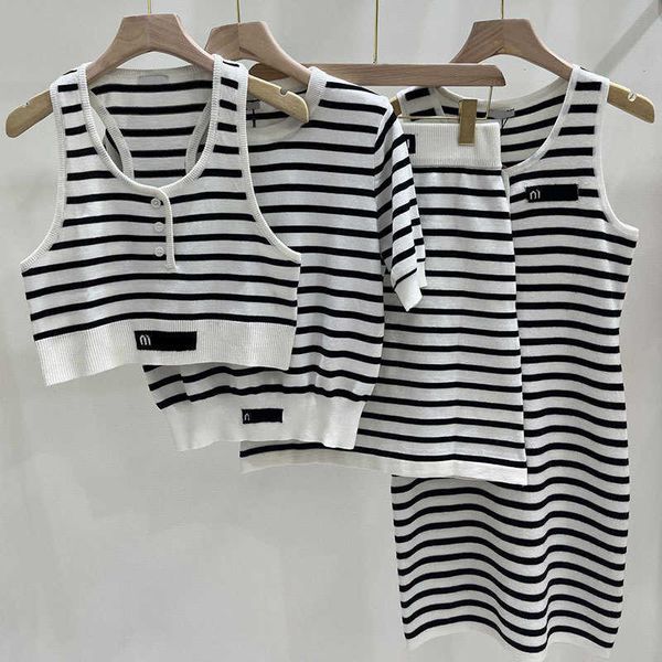 women's striped dress slim black and white contrast sleeveless tank with knitted wrap hip long dress, White;black
women's striped dress slim black and white contrast sleeveless tank with knitted wrap hip long dress, White;black