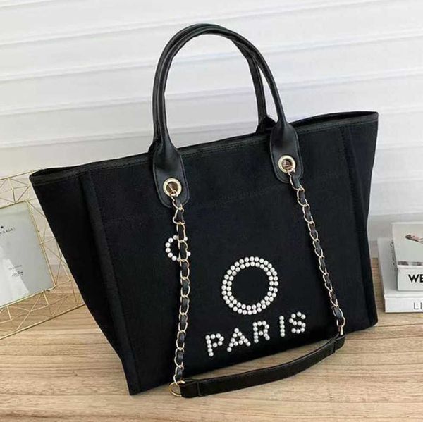 fashion luxury women's beach bags pearl hand bag brand designers women tote evening handbag large capacity female backpacks small porta
fashion luxury women's beach bags pearl hand bag brand designers women tote evening handbag large capacity female backpacks small porta