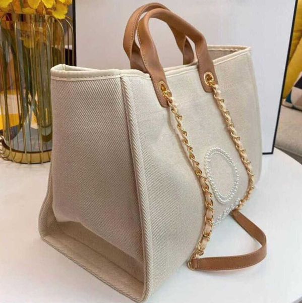women's luxury fashion beach bags pearl hand bag brand cc designers women tote evening handbag large capacity female backpacks small po
women's luxury fashion beach bags pearl hand bag brand cc designers women tote evening handbag large capacity female backpacks small po