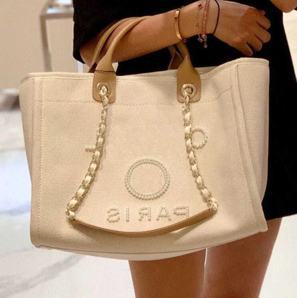 classic luxury women's evening bags pearl beach handbag brand cc designers women tote bag large capacity female backpack small portable
classic luxury women's evening bags pearl beach handbag brand cc designers women tote bag large capacity female backpack small portable