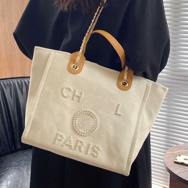 luxury fashion women's beach bags pearl hand bag brand cc designers women tote evening handbag large capacity female backpacks small po
luxury fashion women's beach bags pearl hand bag brand cc designers women tote evening handbag large capacity female backpacks small po