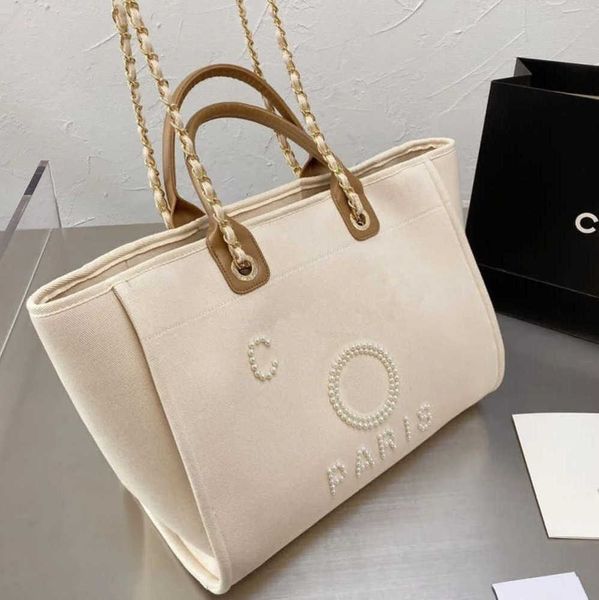 fashion luxury women's beach bags pearl hand bag brand cc designers women tote evening handbag large capacity female backpacks small po, Black;red
fashion luxury women's beach bags pearl hand bag brand cc designers women tote evening handbag large capacity female backpacks small po, Black;red