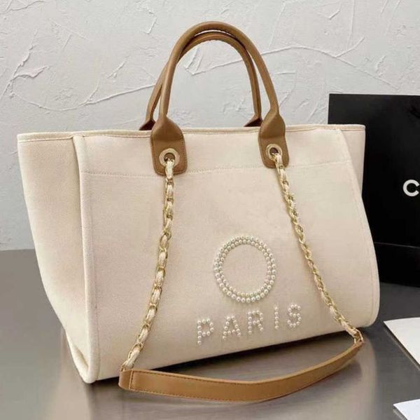fashion luxury women's beach bags pearl hand bag brand designers women tote evening handbag large capacity female backpacks small porta
fashion luxury women's beach bags pearl hand bag brand designers women tote evening handbag large capacity female backpacks small porta